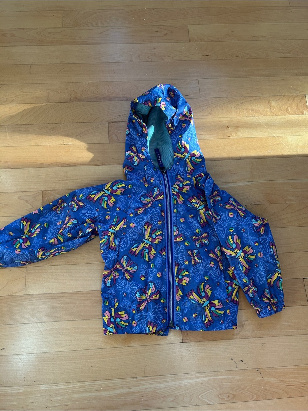 L.L. Bean Blue Hooded Kids Raincoat with Colorful Butterfly Pattern